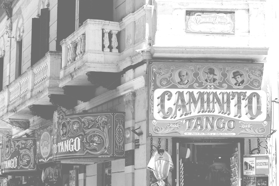 a black and white photo of a building with a sign that says cammino. Argentina

Travel Planner 
3Day Trip Plan
Photography