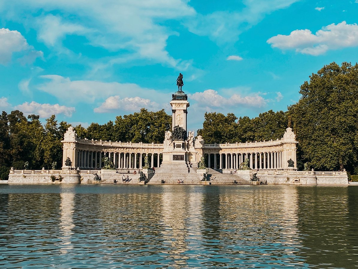 The monument is in the middle of a lake surrounded by trees, Madrid, Spain.

Spain Trip; Travel Planner; 3Day Trip Plan; Photography